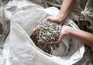 Plastic waste is shredded into flakes